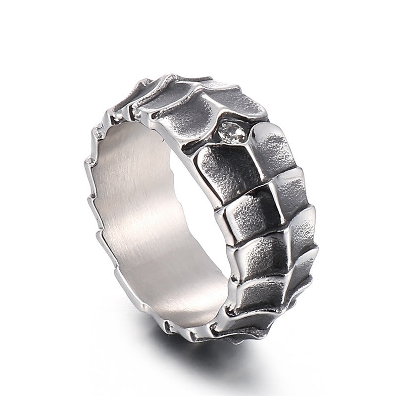 Distressed, minimalist, and stylish dragon-shaped diamond ring