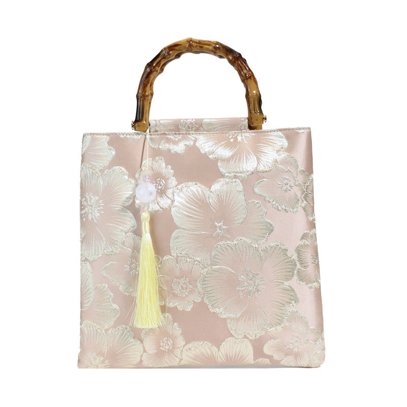 Embroidered sequins linen bamboo handle tote bag