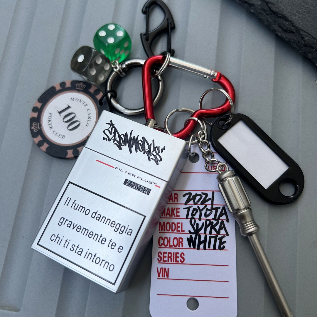 Multi-Element Keychain: Ashtray, Dice, and Wrench