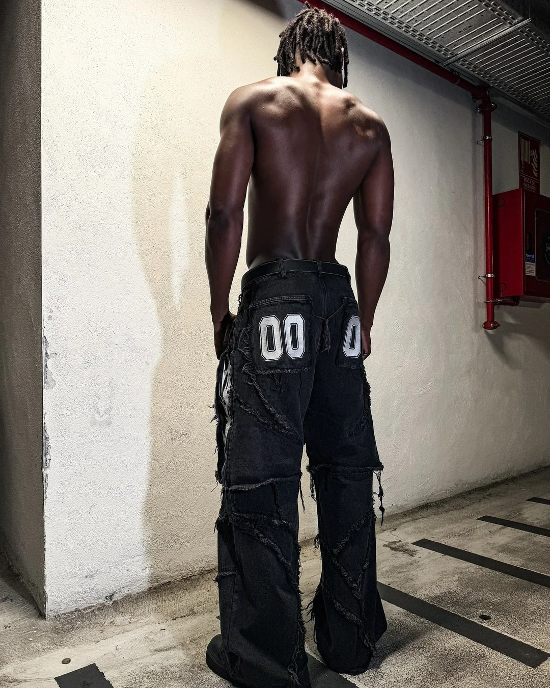 Paneled, Loose-Fit, Embroidered, and Fur-Trimmed Denim Jeans