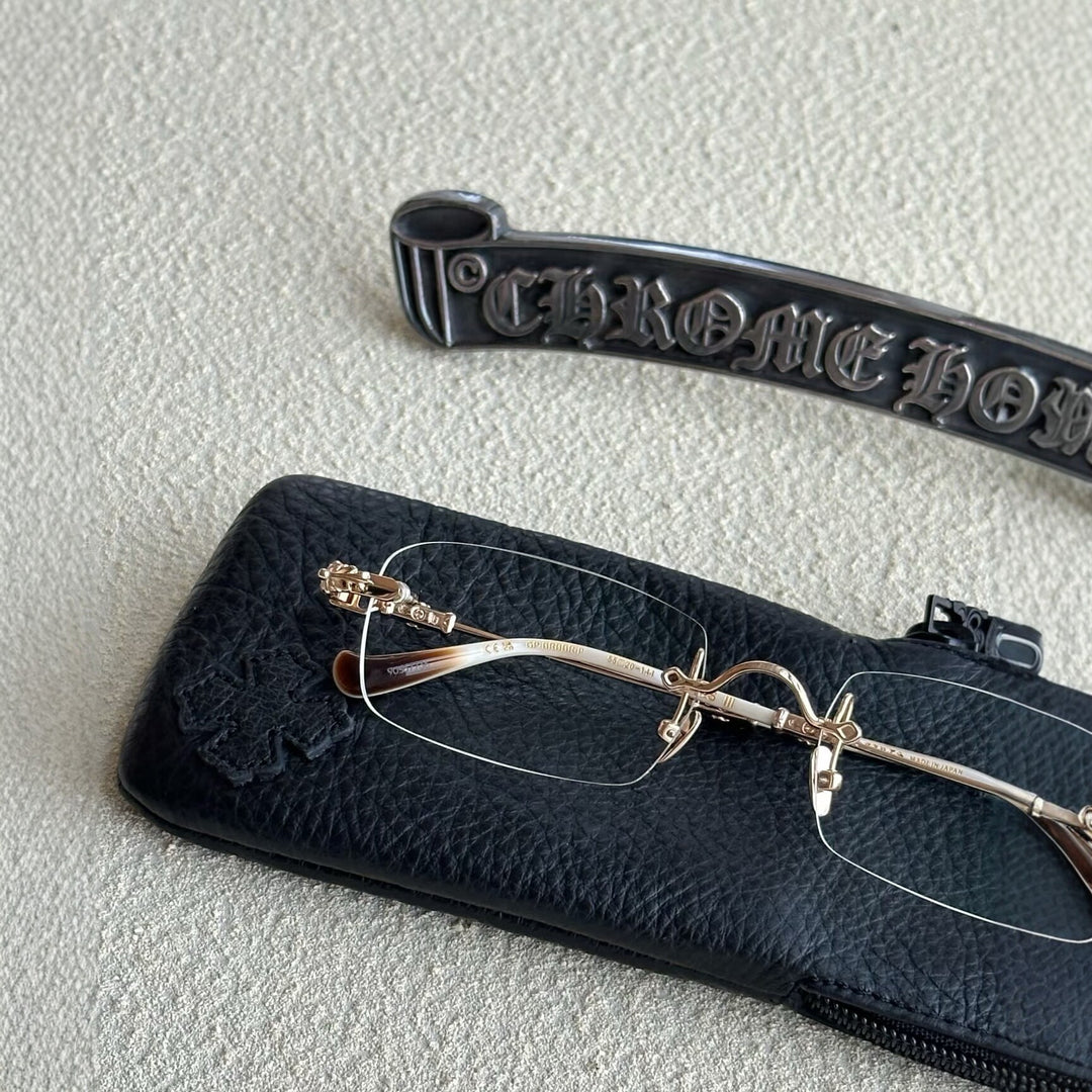 Chrome Hearts Rimless Eyeglass Frames with Cross Engraving
