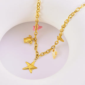 starfish turtle conch gold necklace