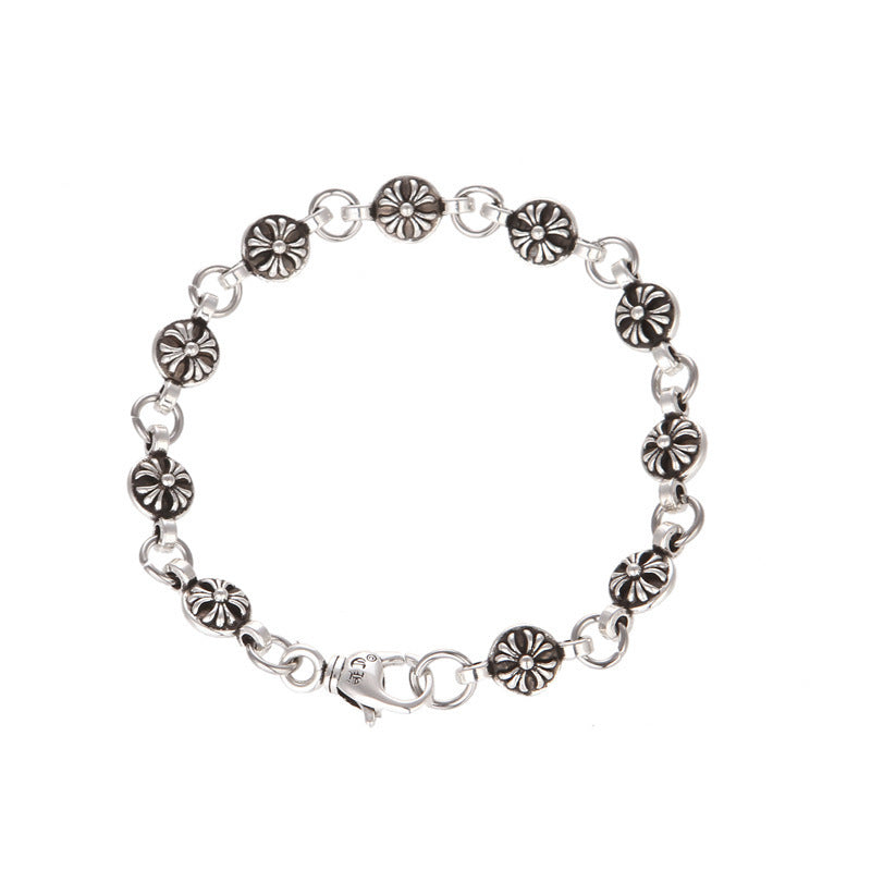 gepersonaliseerde kruisarmband met chromen harten en gesneden kralen