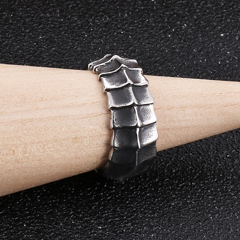 Distressed, minimalist, and stylish dragon-shaped diamond ring