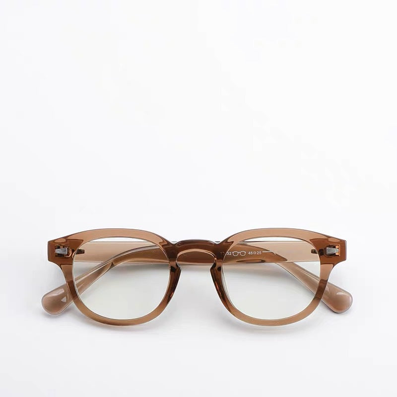 Thick-rimmed round transparent glasses