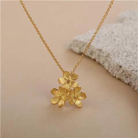 triangle forget me not necklace