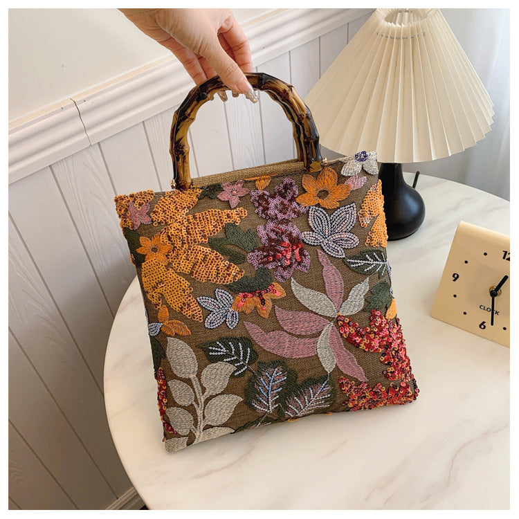 Embroidered sequins linen bamboo handle tote bag