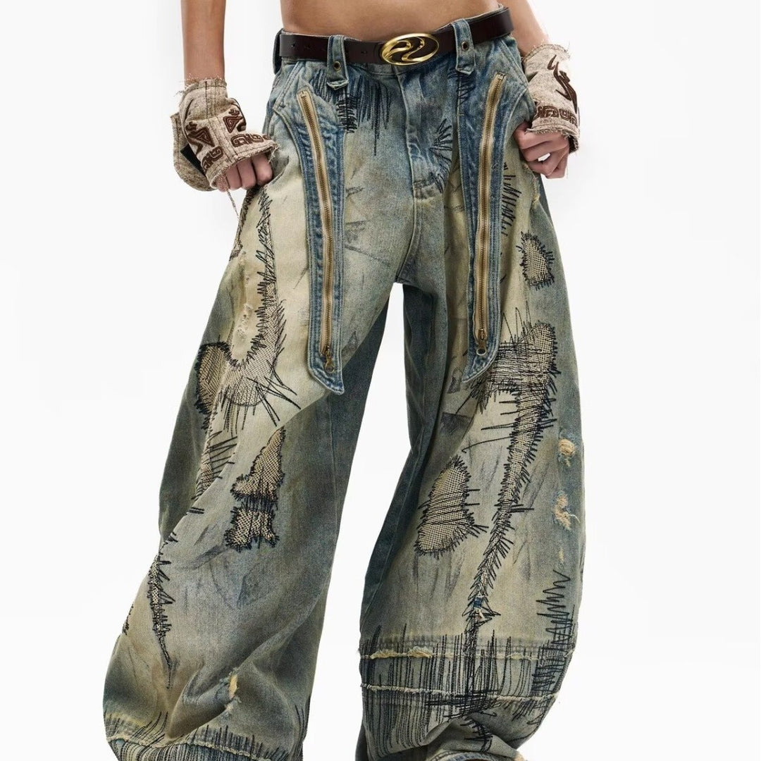 "Random Stitch" Embroidered & Distressed "Scythe" Cut Denim Jeans