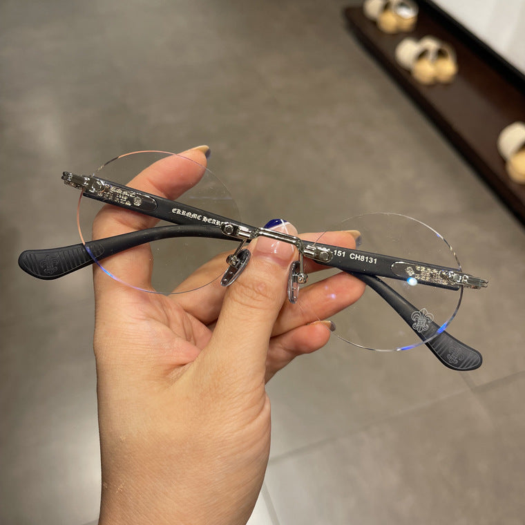 Chrome Hearts frameless round punched retro glasses