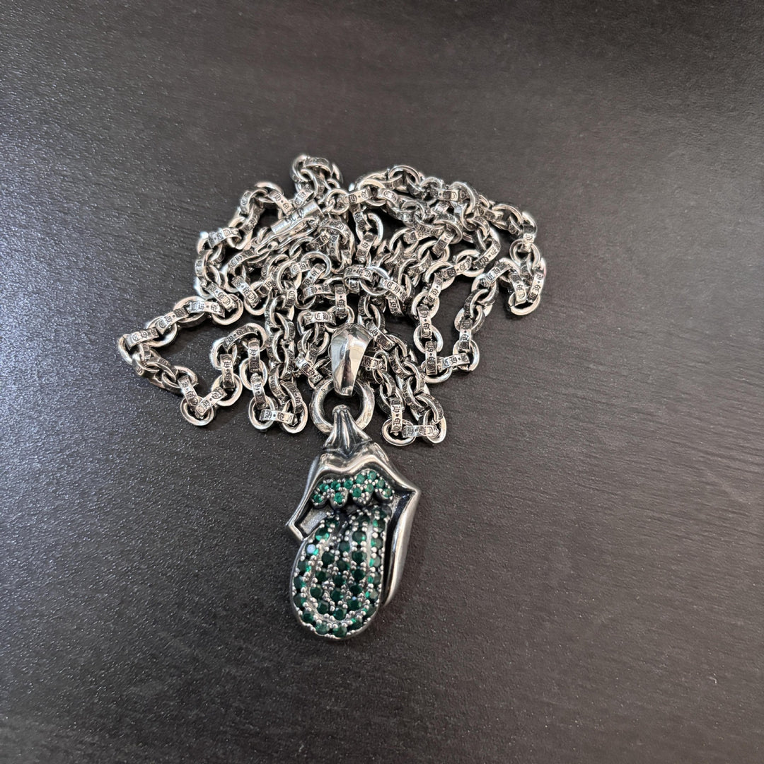 Chrome Hearts diamond-encrusted tongue pendant