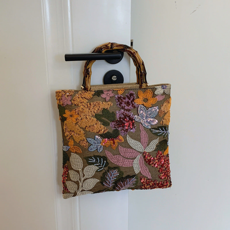 Embroidered sequins linen bamboo handle tote bag