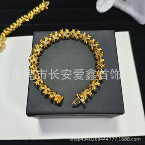 chrome hearts gold diamond cross flower bracelet