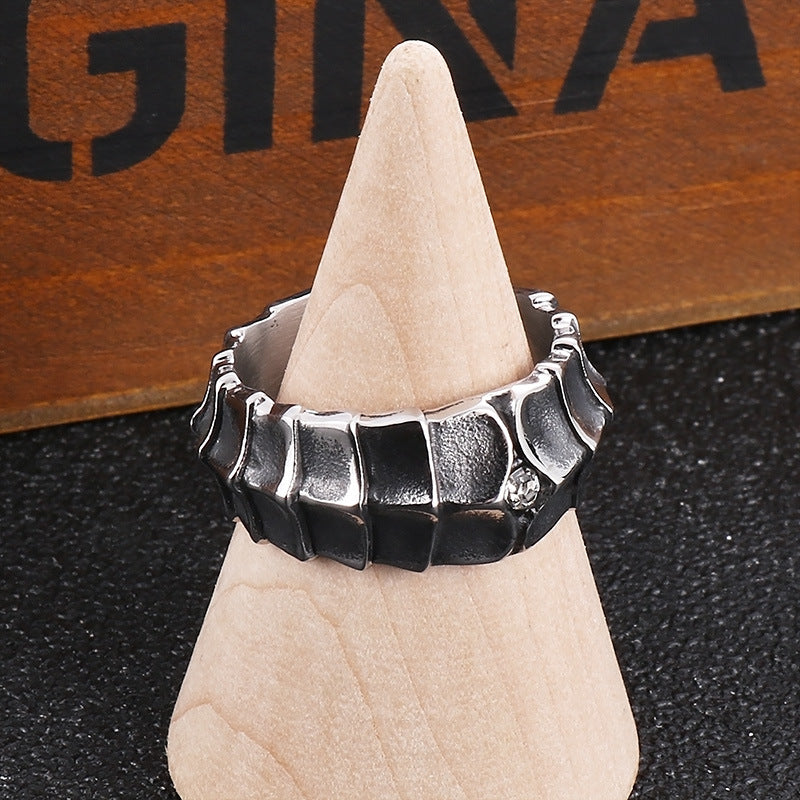 Distressed, minimalist, and stylish dragon-shaped diamond ring