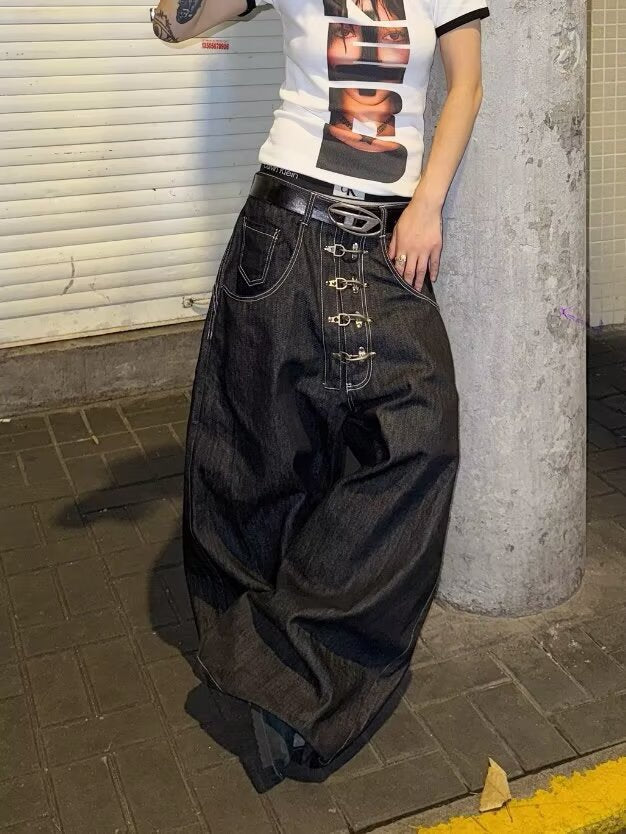 "Aircraft Buckle" Raw-Hem Curved-Leg Jeans