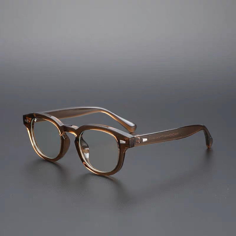 Thick-rimmed round transparent glasses