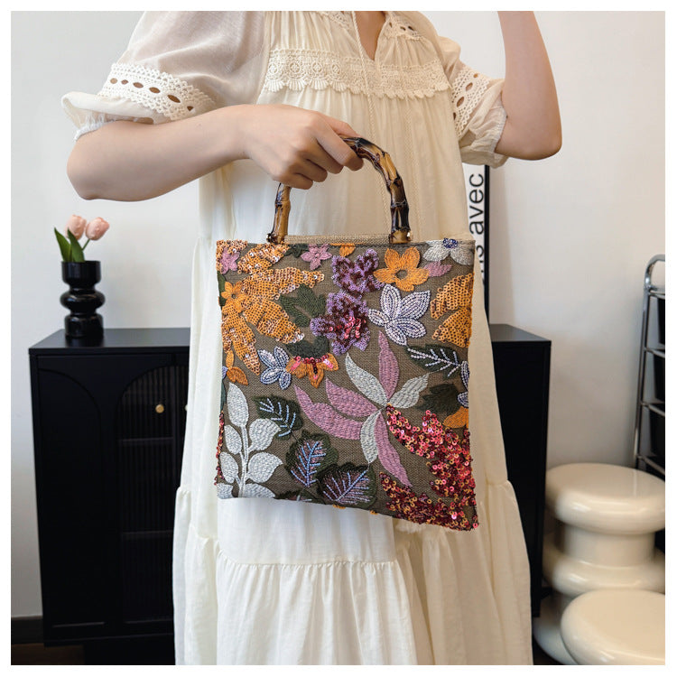 Embroidered sequins linen bamboo handle tote bag