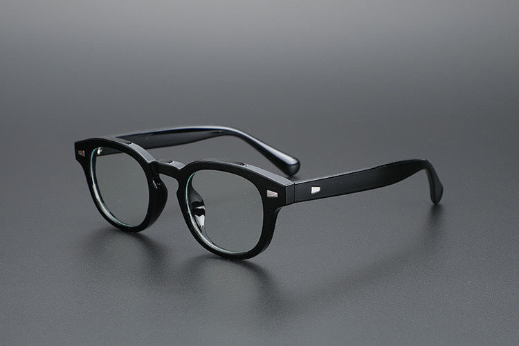Thick-rimmed round transparent glasses