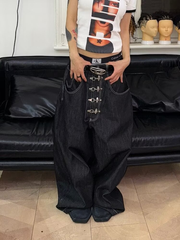 "Aircraft Buckle" Raw-Hem Curved-Leg Jeans