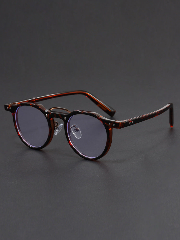 Hexagonal-rimmed aviator style sunglasses.