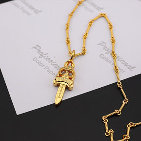 chrome hearts gold diamond dagger necklace