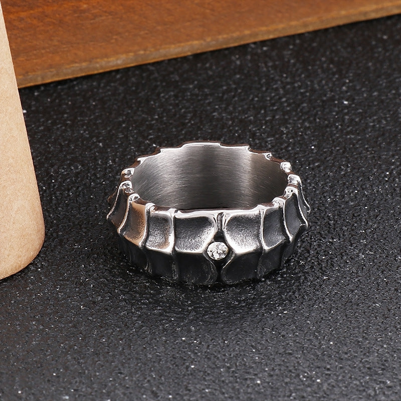 Distressed, minimalist, and stylish dragon-shaped diamond ring
