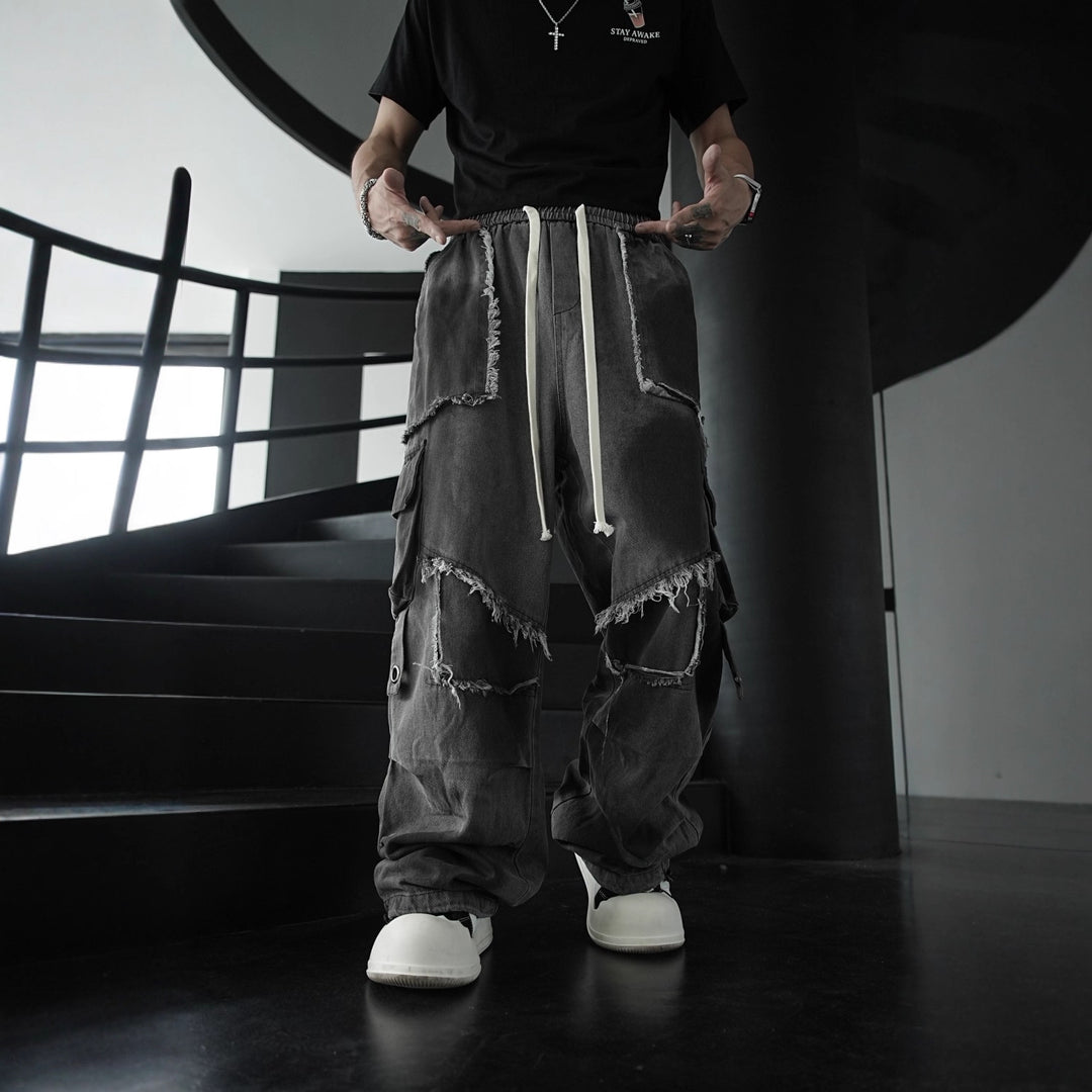 Washed multi-pocket patchwork frayed edges denim jeans