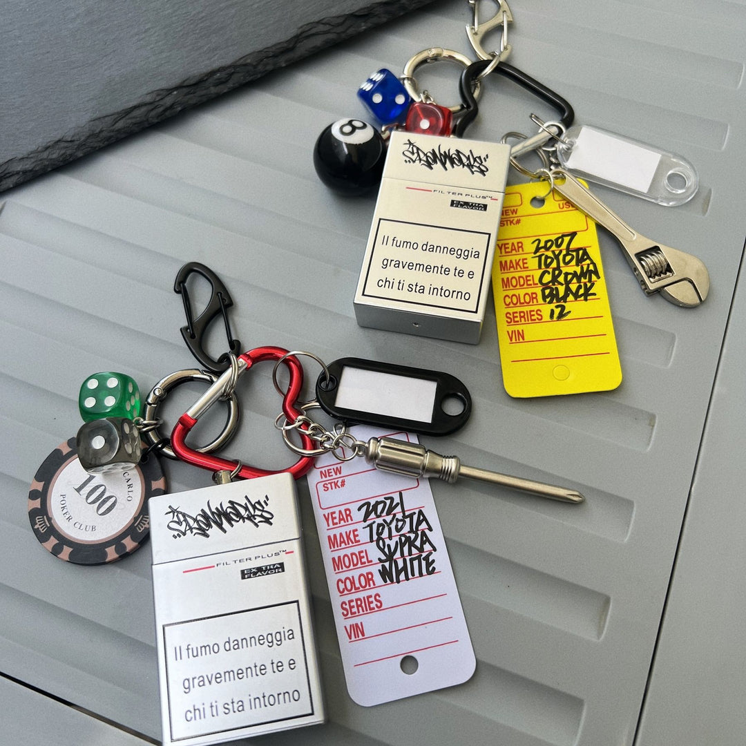 Multi-Element Keychain: Ashtray, Dice, and Wrench
