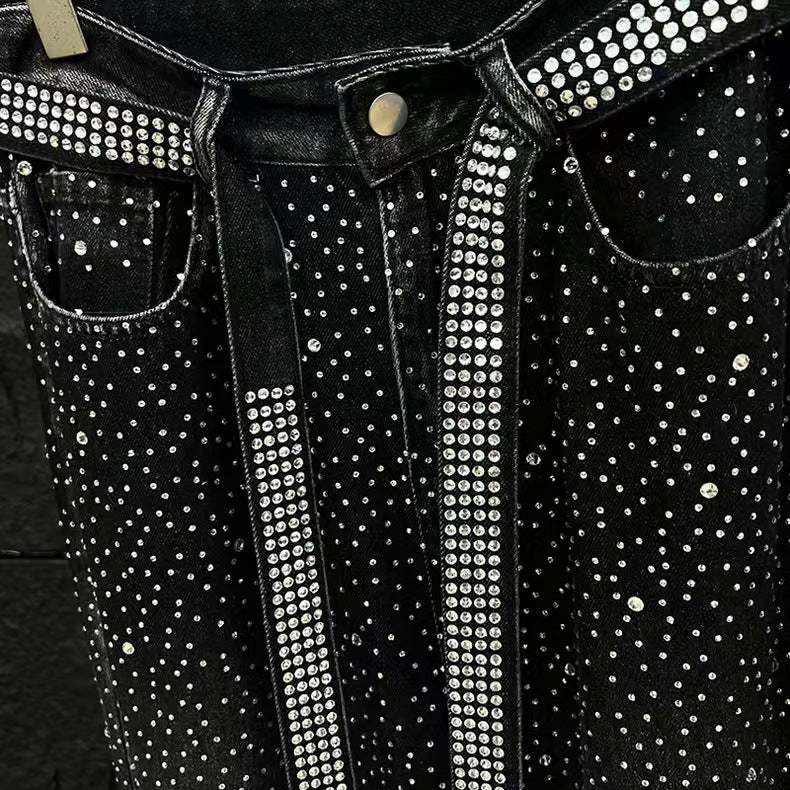 Rhinestone and ribbon washed denim jeans