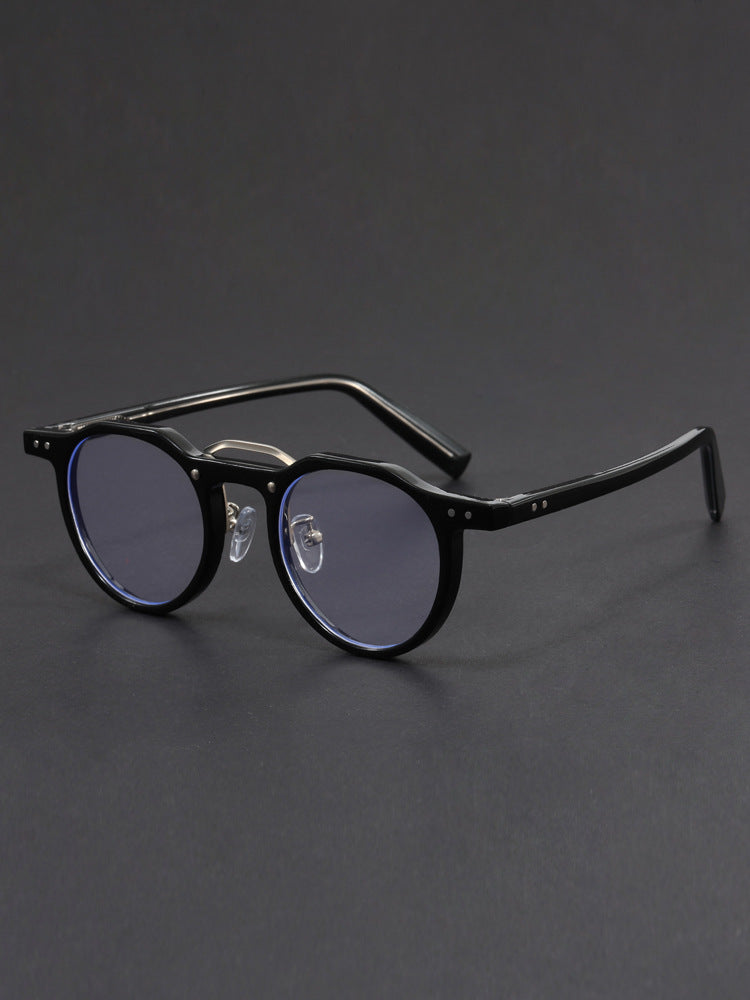 Hexagonal-rimmed aviator style sunglasses.