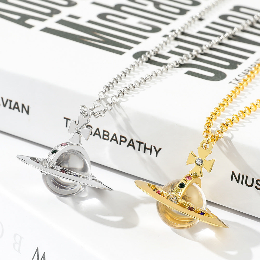 Saturn necklace, teardrop colored diamond earrings, Saturn earrings