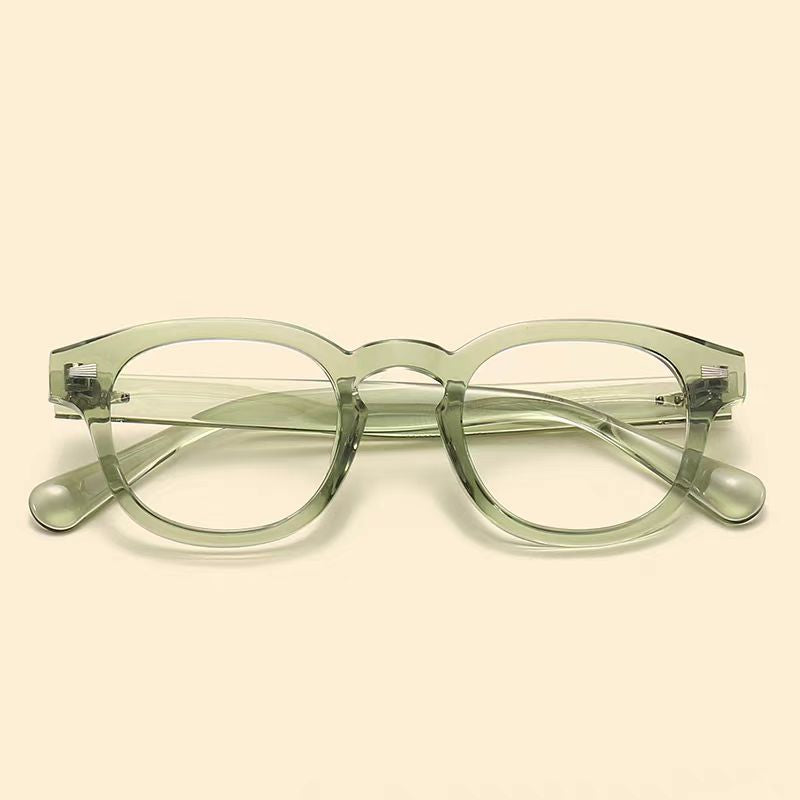 Thick-rimmed round transparent glasses