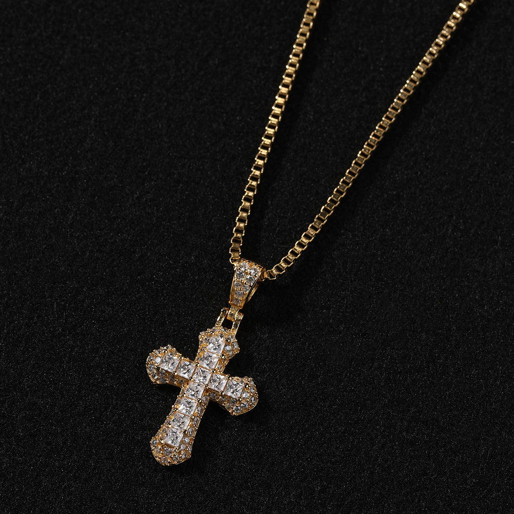 Gold-plated, diamond-encrusted mini cross necklace