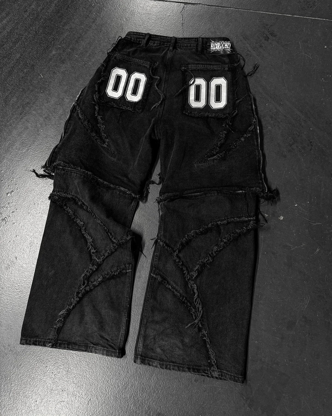Paneled, Loose-Fit, Embroidered, and Fur-Trimmed Denim Jeans