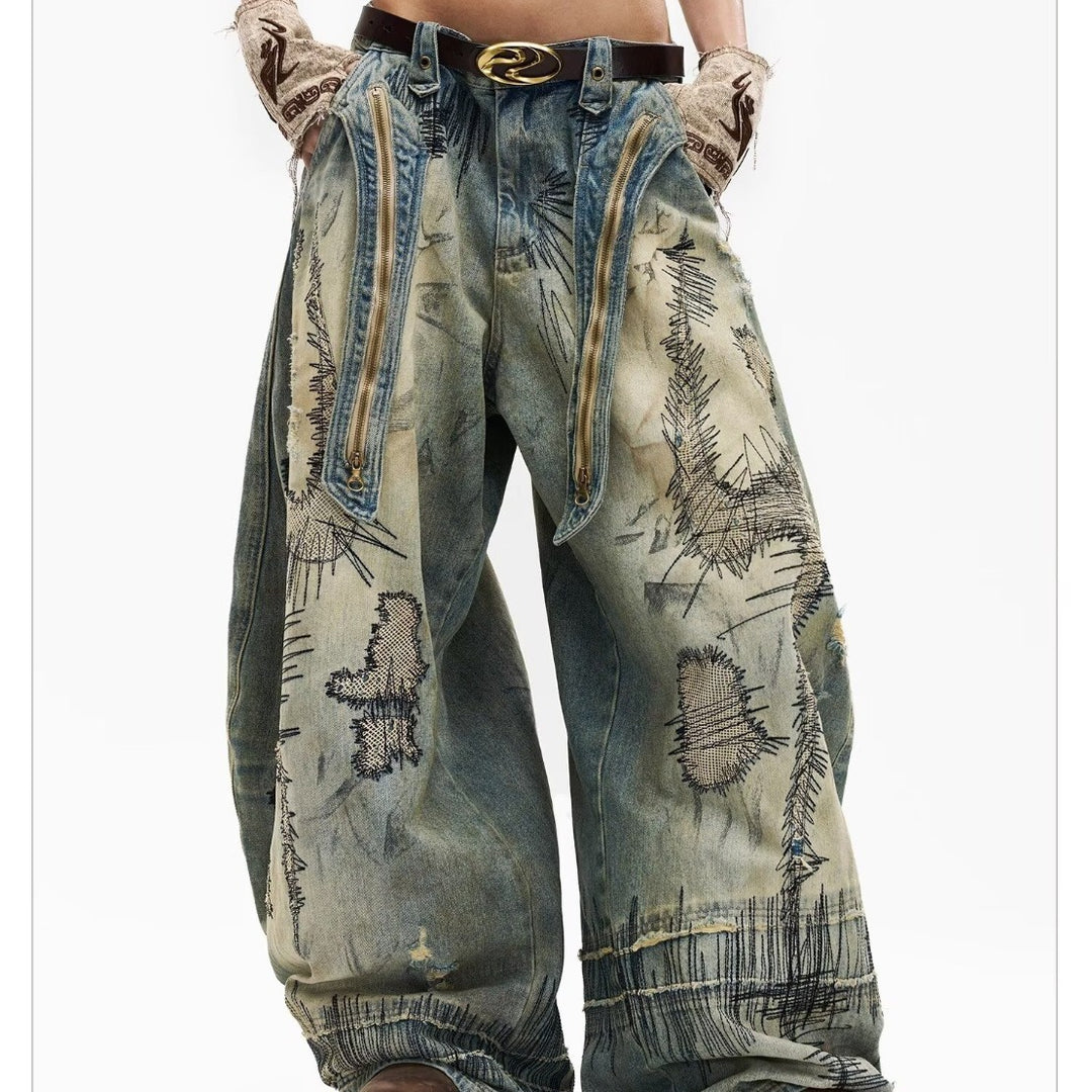 "Random Stitch" Embroidered & Distressed "Scythe" Cut Denim Jeans