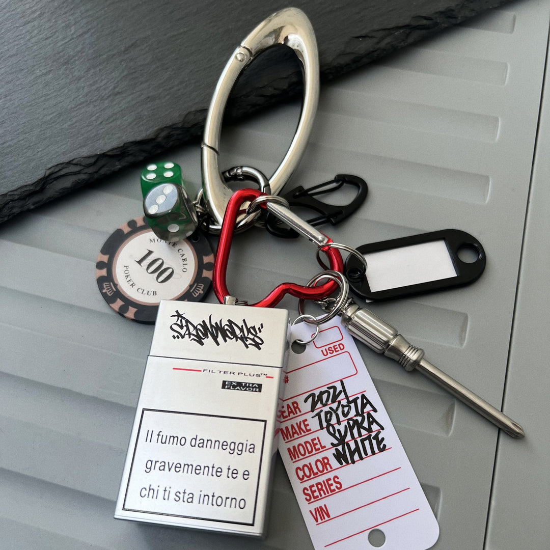 Multi-Element Keychain: Ashtray, Dice, and Wrench