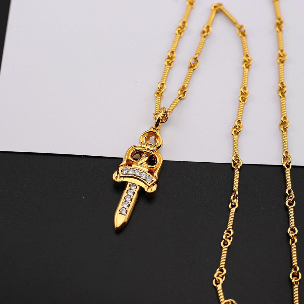 chrome hearts gold diamond dagger necklace