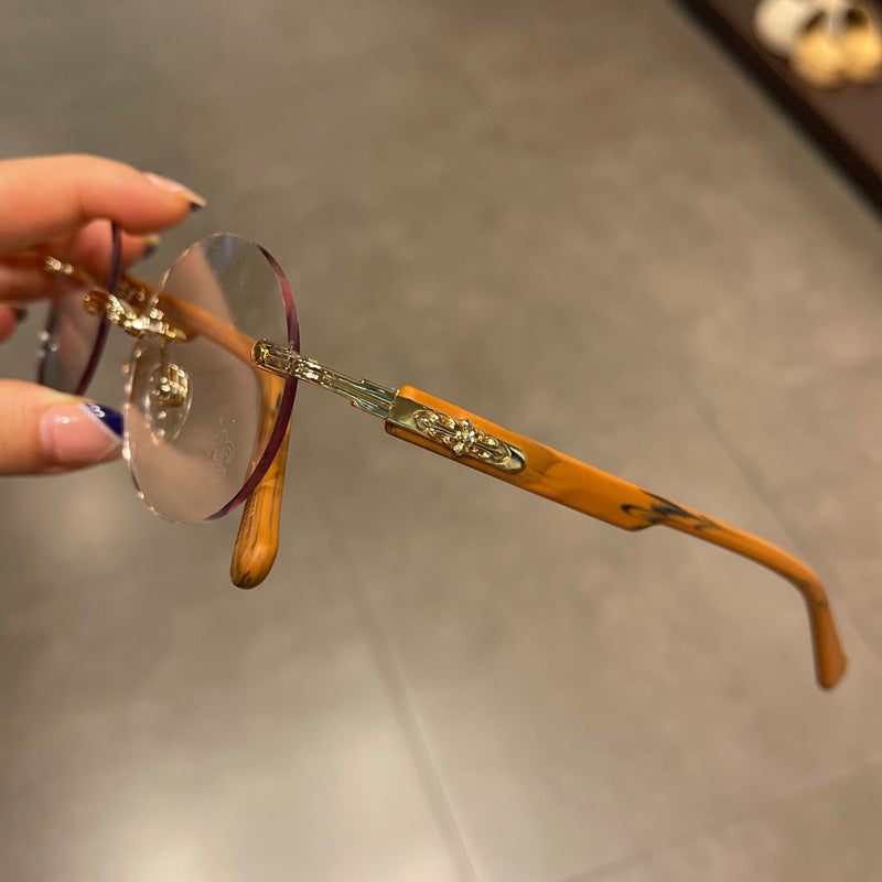 Chrome Hearts frameless round punched retro glasses