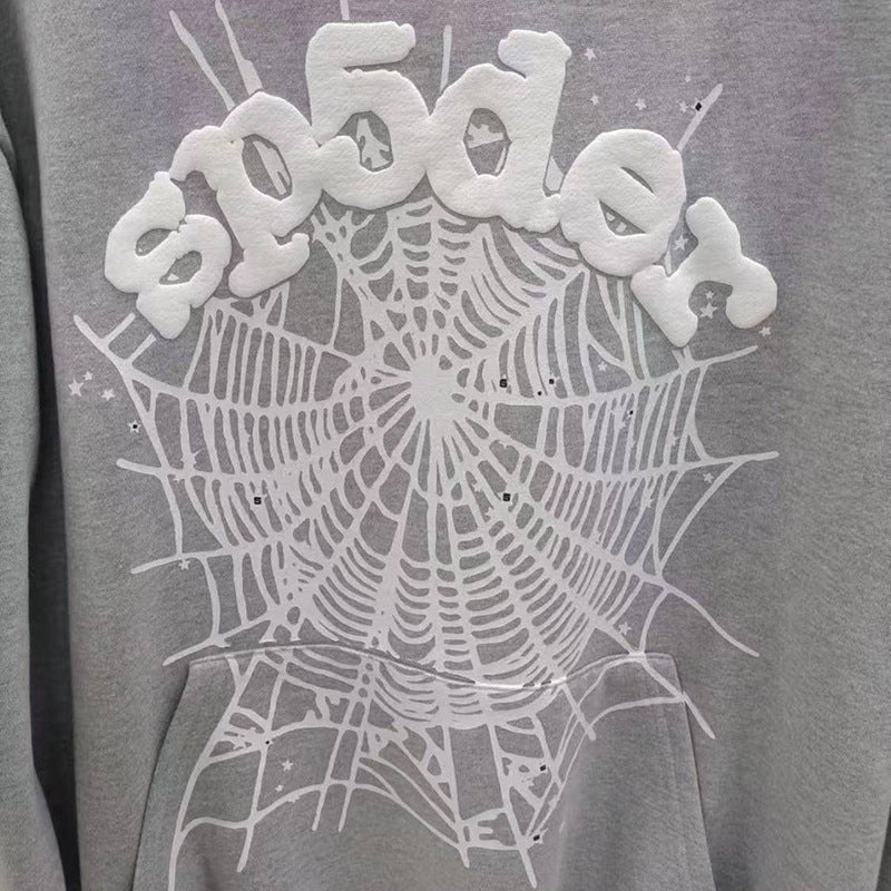 Sp5der fleece-lined hoodie with spiderweb print.