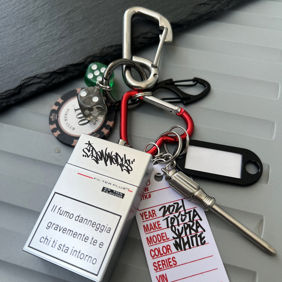 Multi-Element Keychain: Ashtray, Dice, and Wrench