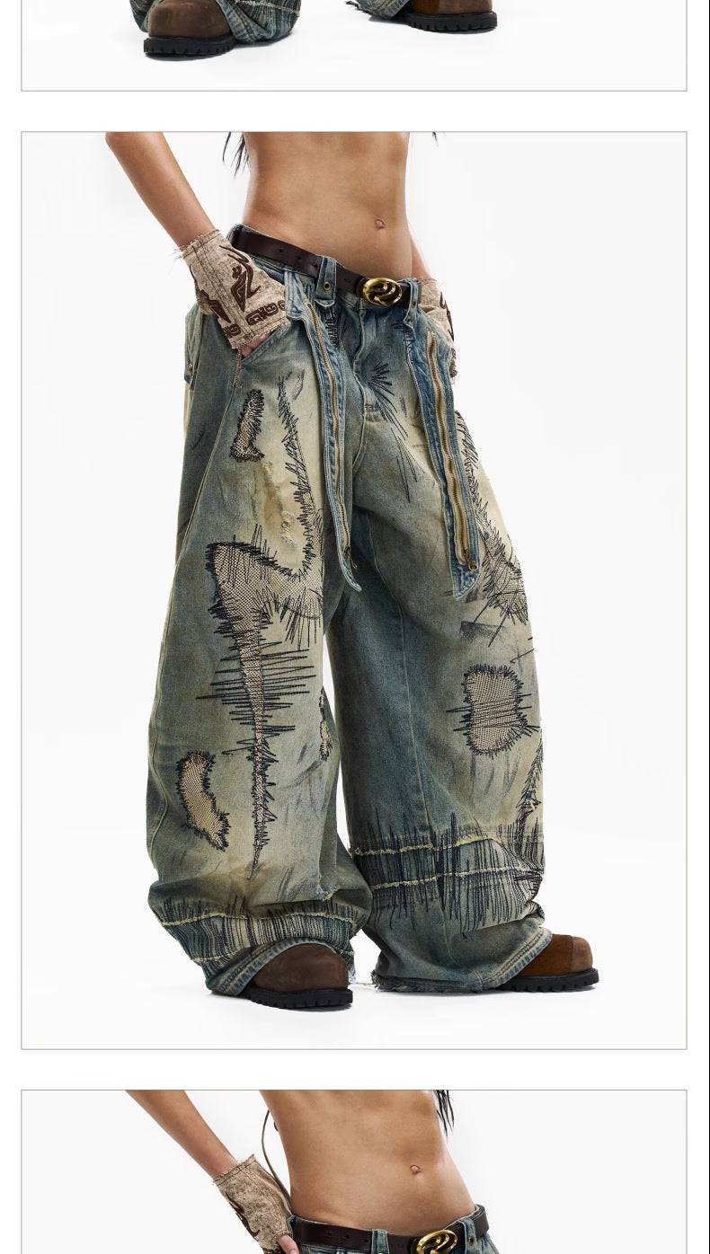 "Random Stitch" Embroidered & Distressed "Scythe" Cut Denim Jeans