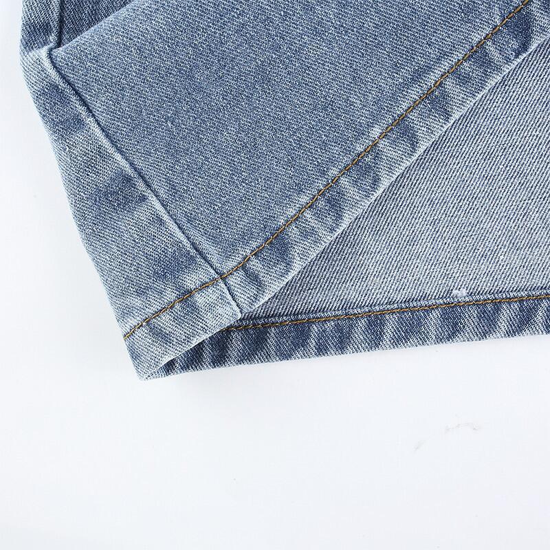 High-waisted denim mini skirt with one-sided cutout