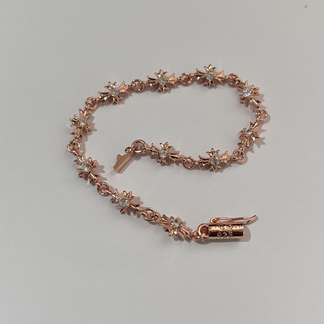 Chrome Hearts rose gold cross diamond bracelet.
