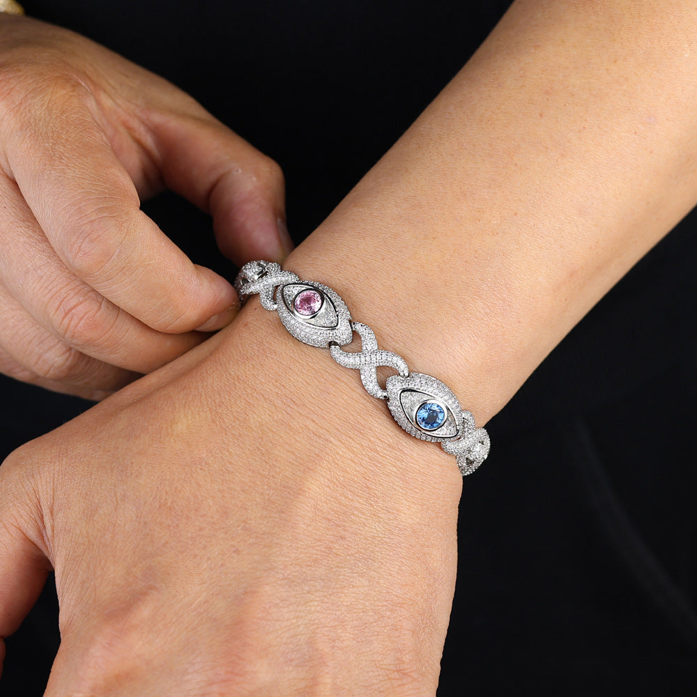 Eye-themed infinity bracelet with colored zircon, figure-eight chain