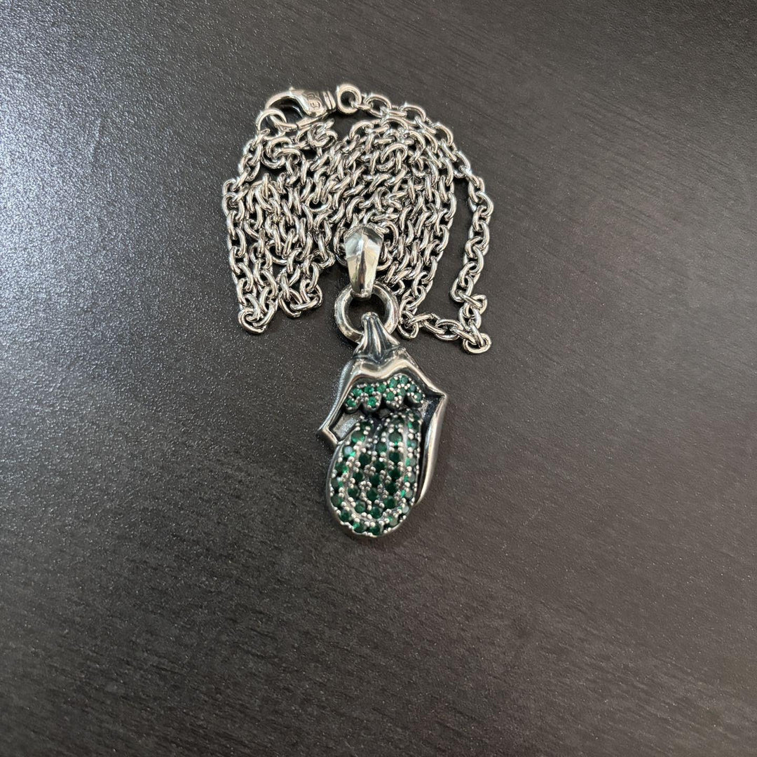 Chrome Hearts diamond-encrusted tongue pendant