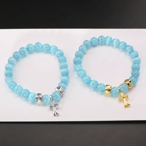 chrome hearts blue cat's eye stone cross bracelet