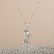 triangle forget me not necklace