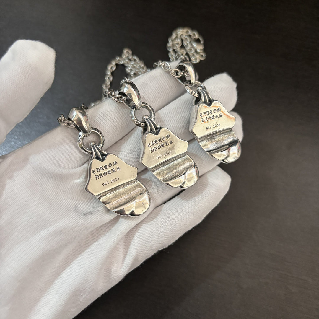 Chrome Hearts diamond-encrusted tongue pendant