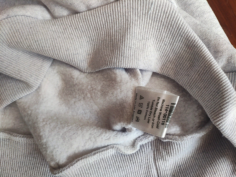 Sp5der fleece-lined hoodie with spiderweb print.