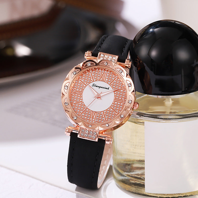 Korean-style quartz watch with a simple leather strap.