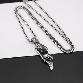 Vintage feather crown skull necklace